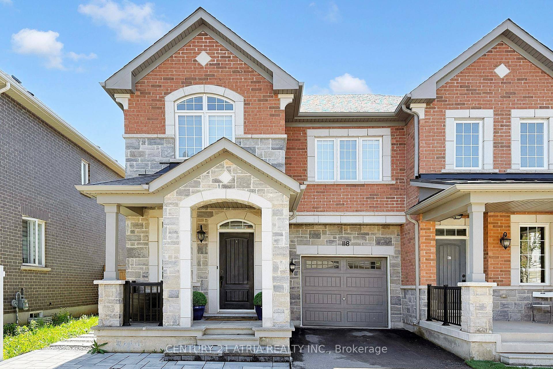Beautifully maintained end unit townhome in Oakville's sought after Preserve neighbourhood feels just like a semi !