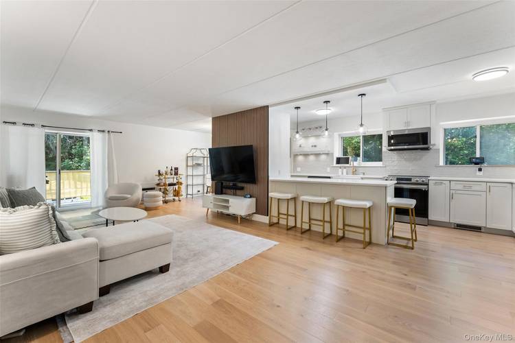 Experience effortless living in this stunning, turnkey two bedroom, two bathroom condominium ideally located in the highly desirable village of Tarrytown.