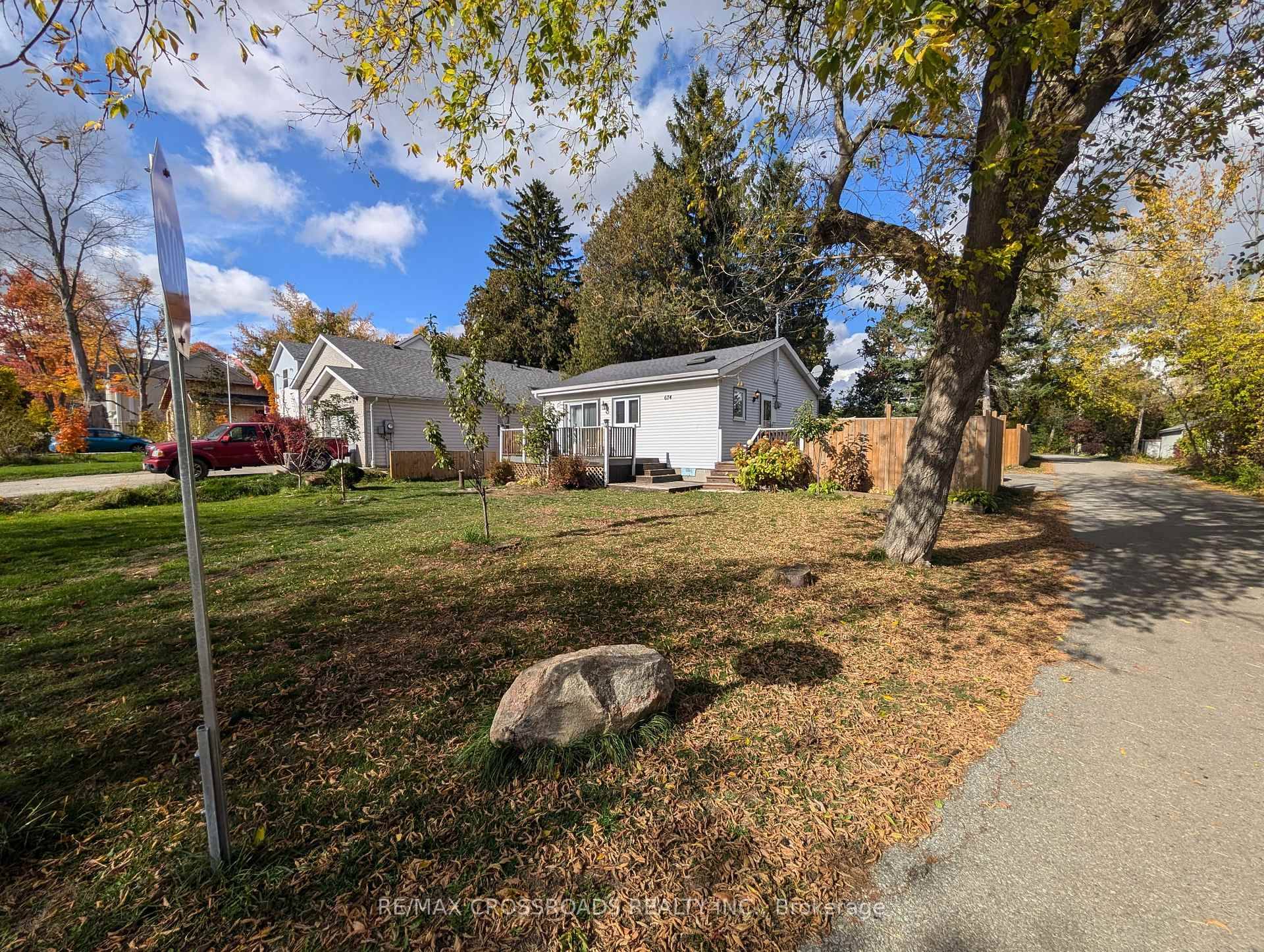 Just steps from the scenic shores of Leonard's Beach, this well maintained corner lot home offers the perfect blend of comfort, privacy, and convenience.