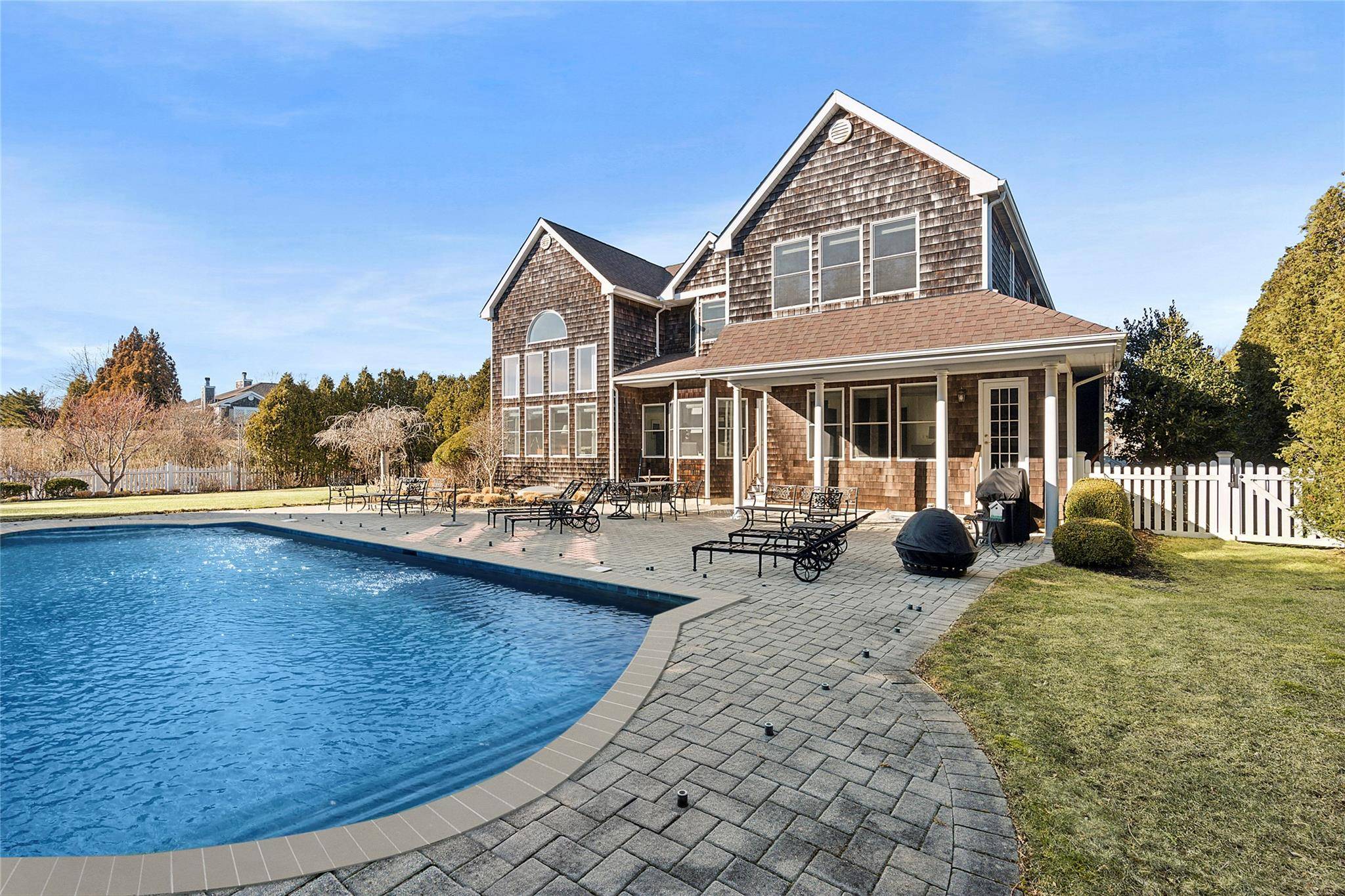 Stunning Southampton Retreat with Community Tennis Experience luxury living in this spacious and impressive 5 bedroom, 5.