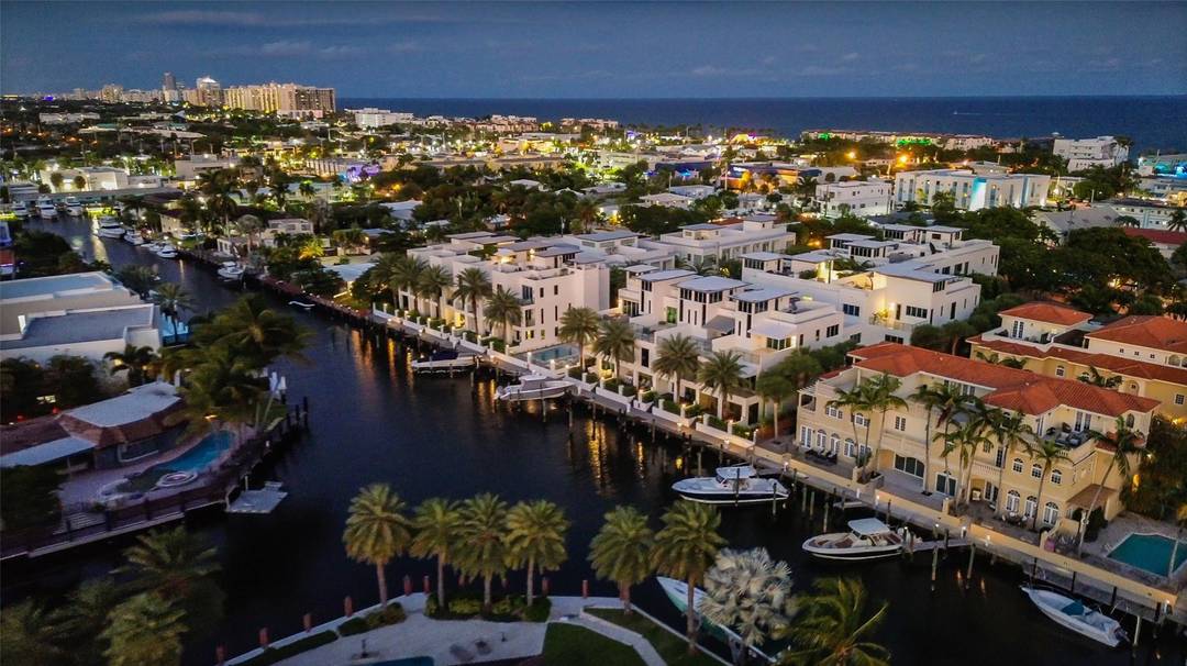 Coastal charm meets elevated elegance at this four level, modern townhouse in the beach town of Lauderdale by the Sea.