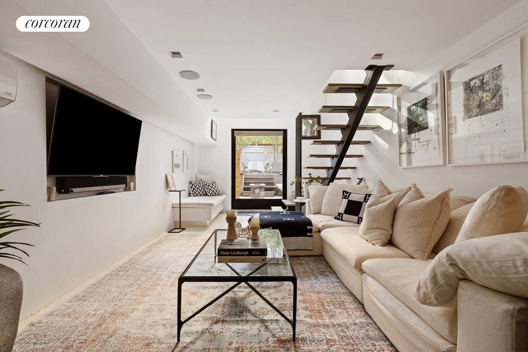 Perfectly positioned on one of Chelsea's most picturesque tree lined streets, this beautifully renovated two bedroom, garden duplex offers a rare blend of refined design and exceptional indoor outdoor living.