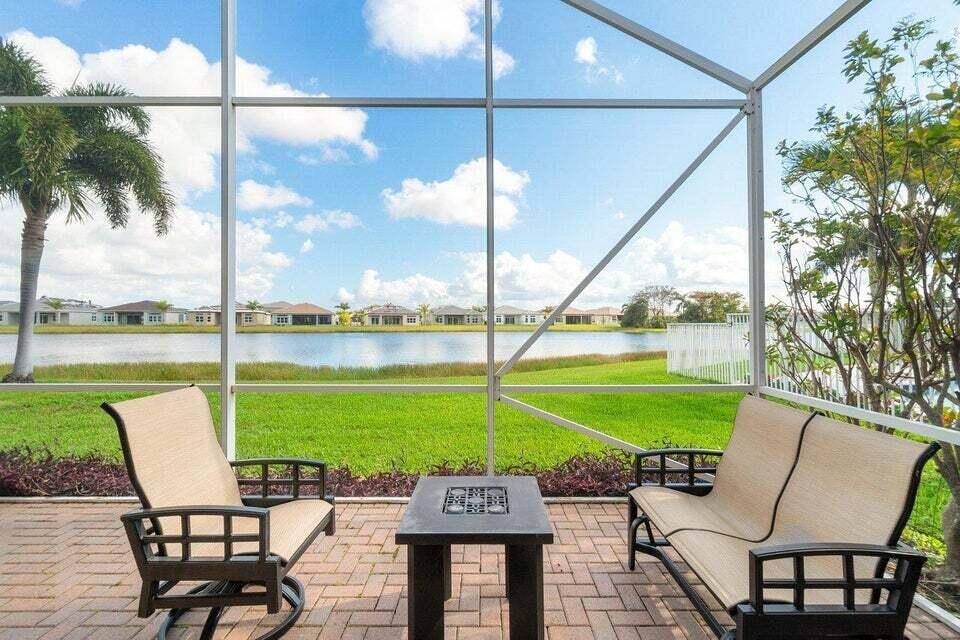 Experience the lifestyle of Polo Trace in this beautiful 3 bedroom 2 bath home which is located on a premium lot, overlooking a gorgeous lake with a large screened lanai.