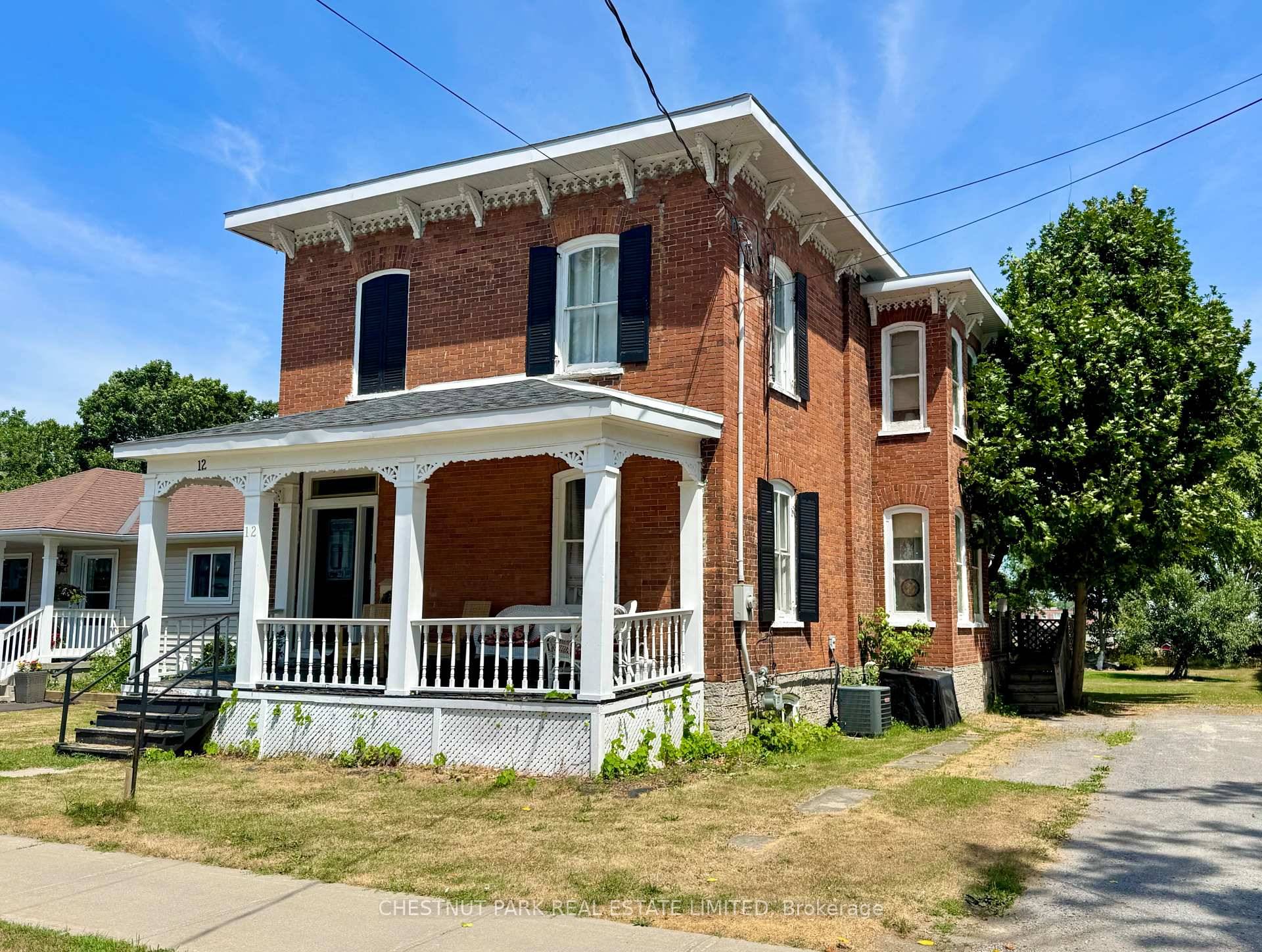 Welcome to this charming 2 storey brick century home nestled in the heart of Picton, Prince Edward County.