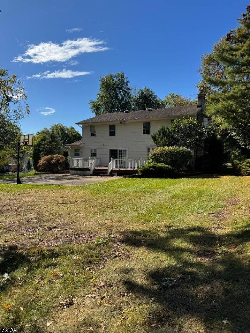 Welcome to this beautifully maintained four bedroom center hall colonial in Mountainside, New Jersey, ideally situated on a quiet cul de sac across from the parks and playgrounds at Beechwood ...