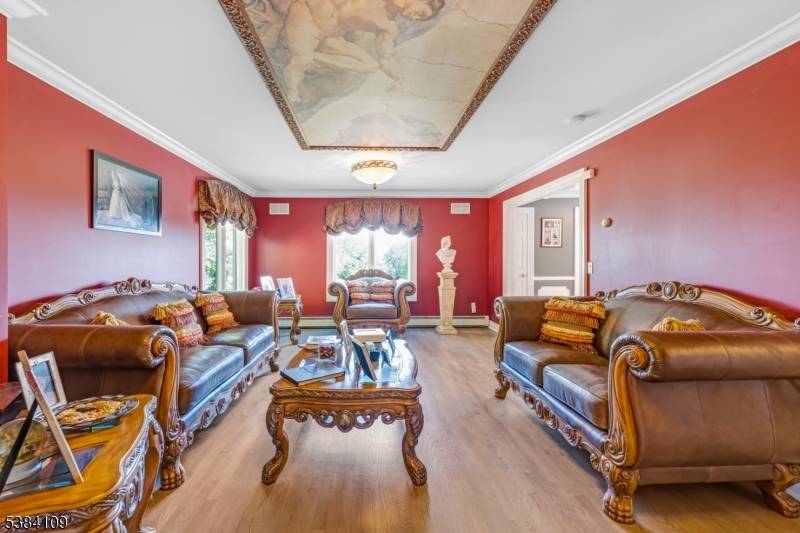 Gorgeous custom built, this Colonial sits at the end of a cul de sac in Cedar Grove's coveted Park Ridge Estate section, capturing breathtaking views and exceptional privacy.