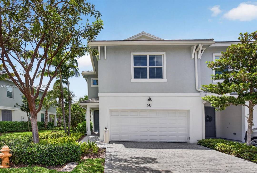 This exceptional corner unit townhome offers 3 bedrooms, 2 full bathrooms, a first floor half bathroom and a 2 car garage, combining modern style with the comfort of newer construction.