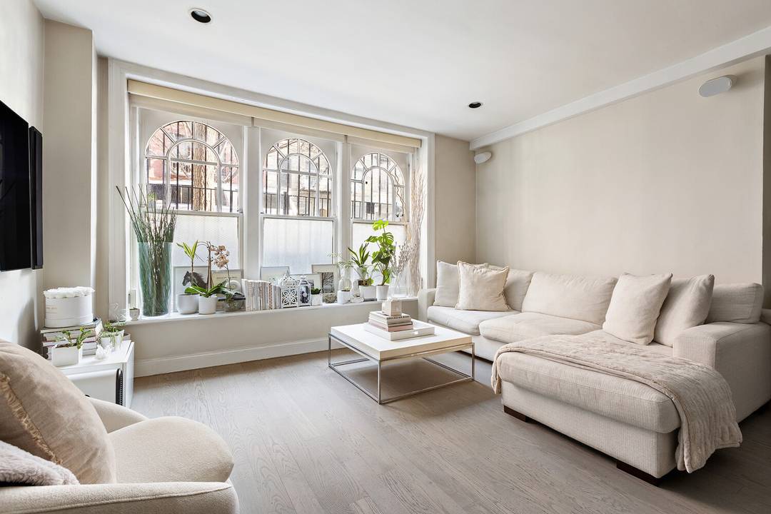 Rarely available, this oversized and mint one bedroom CONDO is in a romantic turn of the century townhouse on quiet Noho East Village block.