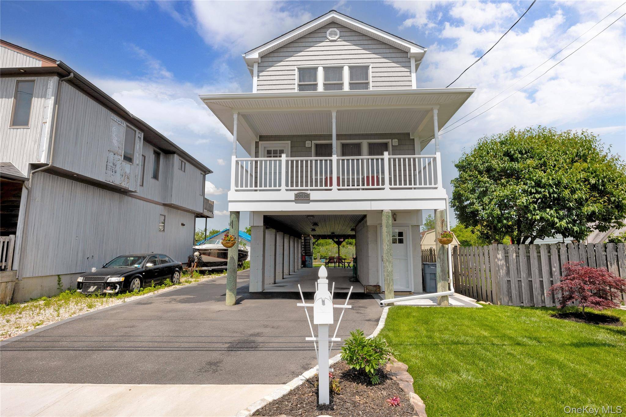 Magnificent, stunning Waterfront Home situated deep into Seaford Harbor overlooking Seamans Neck Park, across from canal w no neighbors, 5 minute boat ride to Great South Bay, 34 feet of ...