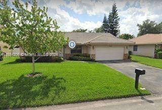 Located in the heart of Coral Springs this suburban retreat home has everything to offer !