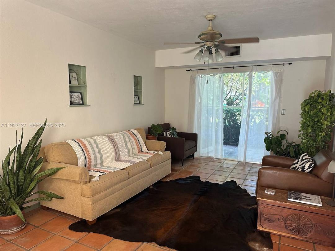 Boho style charm in this Miami Shores garden first floor apartment home with amazing natural light.