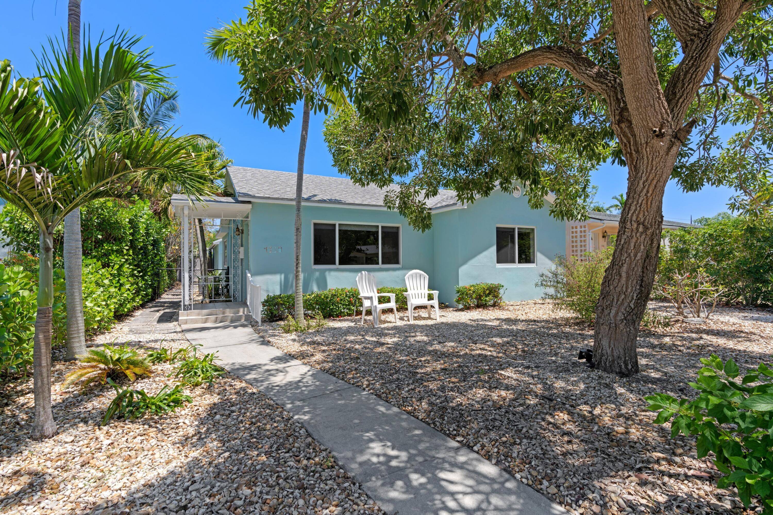 Northeast Lake Worth Beach, 3 bedrooms,, 2 baths, and a large detached garage.