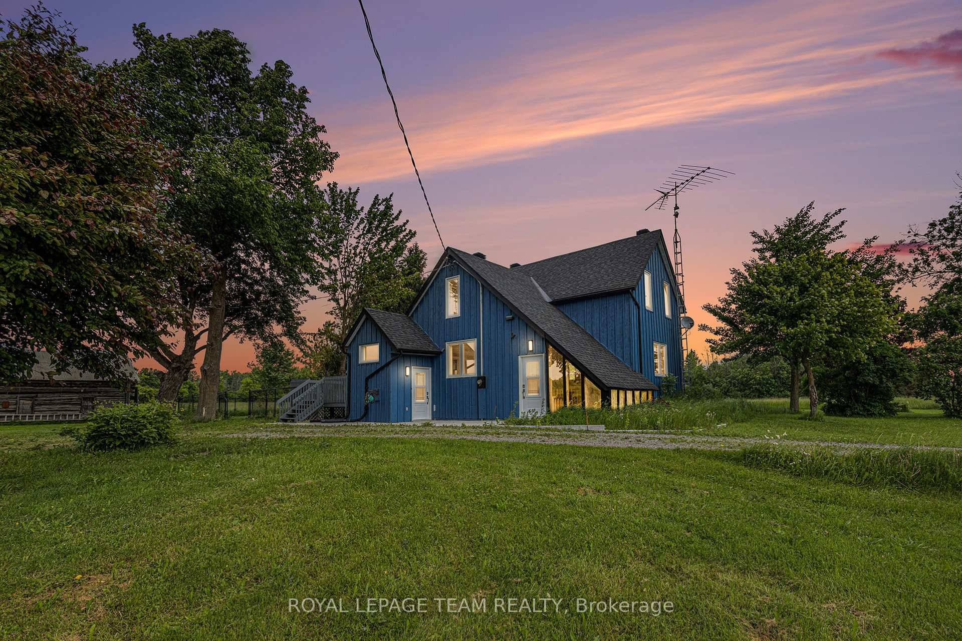 Beautifully renovated 3 Bedroom 2 Bathroom home set on a serene 6 acre lot surrounded by picturesque farmland.