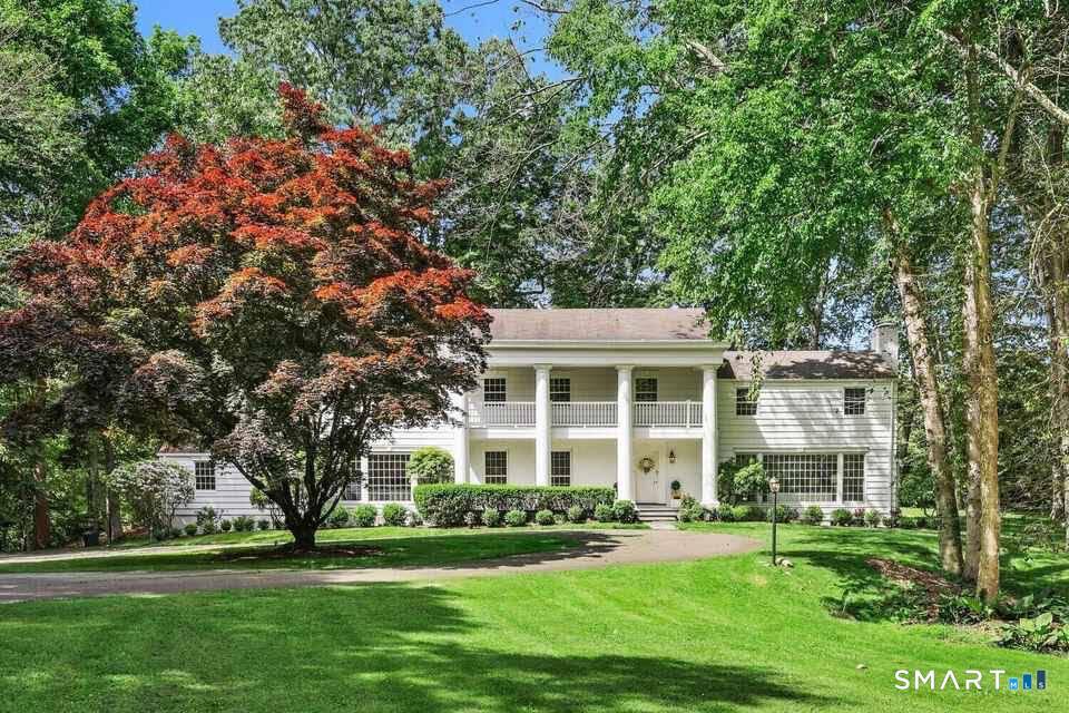 Set 250 feet back on a prime 2 acre cul de sac, this 4, 634 sq ft custom Colonial defines estate style luxury.