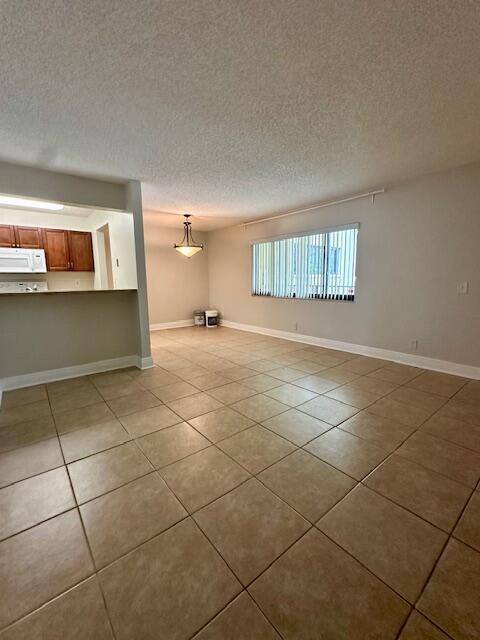 Welcome to this freshly repainted 2 bedroom, 2 bath second floor unit located in the gated community of The Meadows in the heart of Boynton Beach.