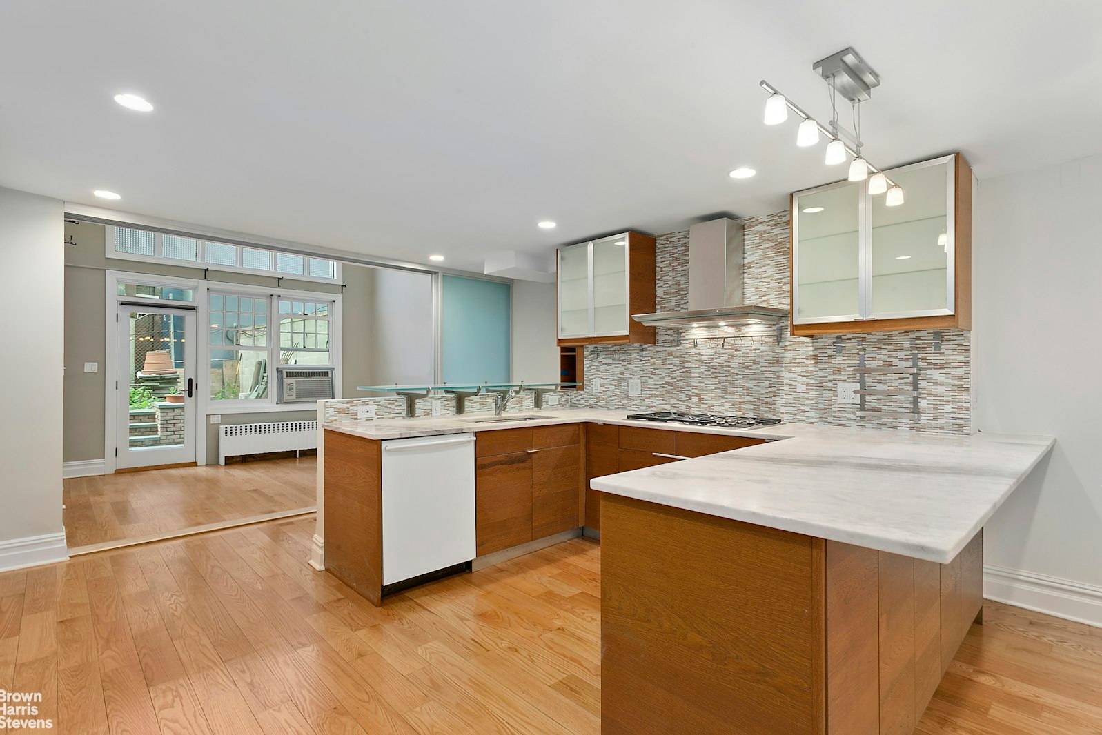 Don't miss this beautifully renovated 2 bedroom, 2 bath garden level apartment in a classic 1845 townhouse.