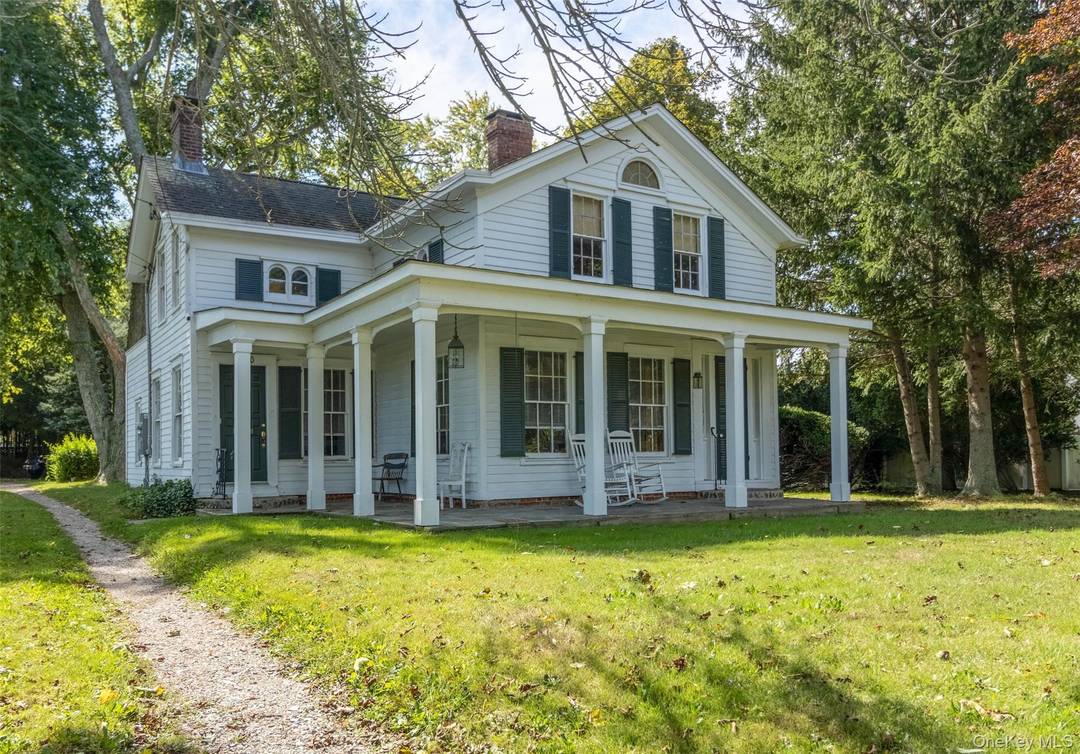 Circa 1900 farm house abutting vineyard located in Mattituck Cutchogue School District.