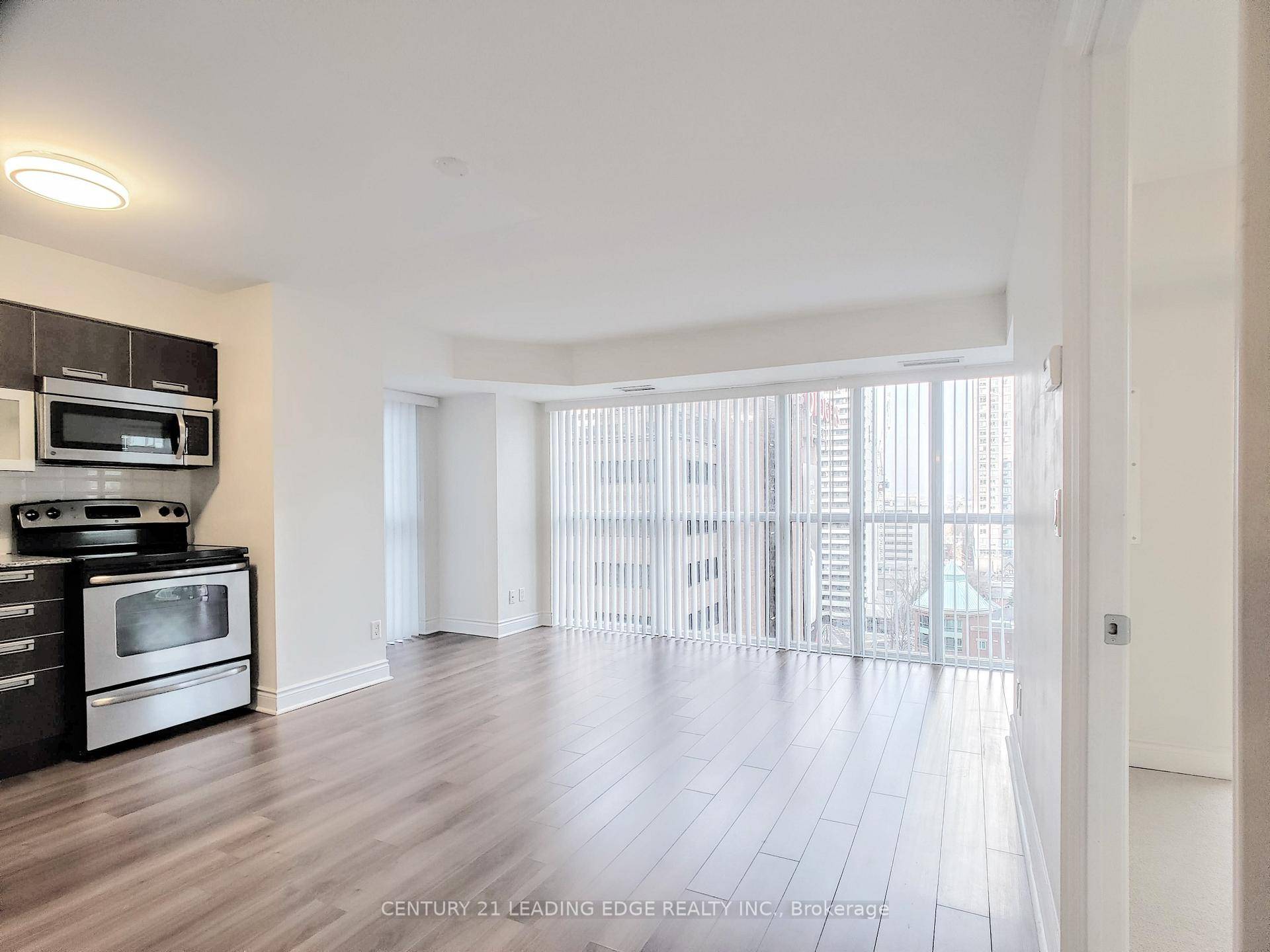 Beautiful Corner like 1 Bedroom Den amp ; open balcony Laminate Throughout Main Living Area Granite Countertops Stainless Steel Appliances Open Concept Living Space W lots Of wall to wall ...