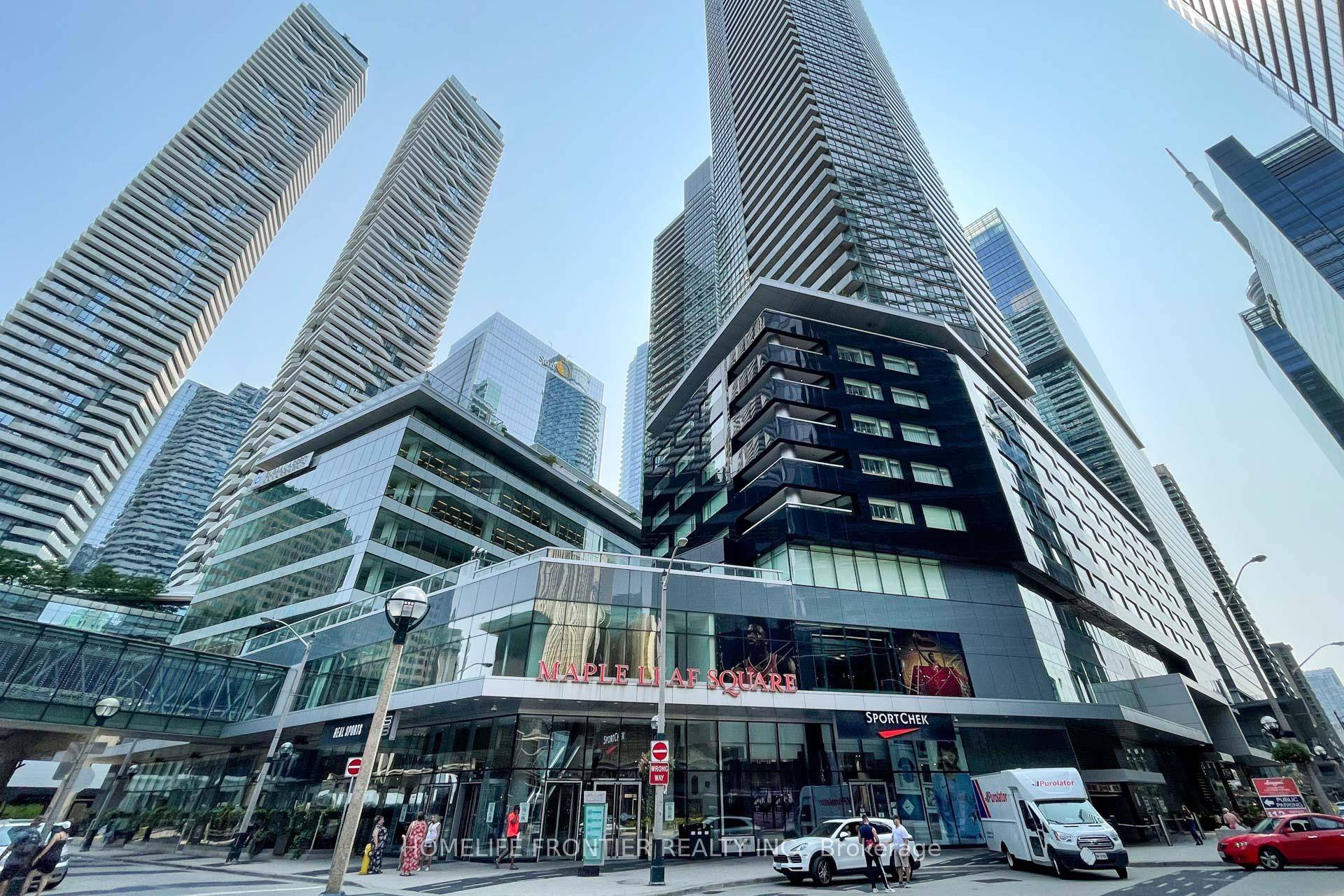 FRESHLY PAINTED Live In Luxury At The Award Winning Maple Leaf Square !