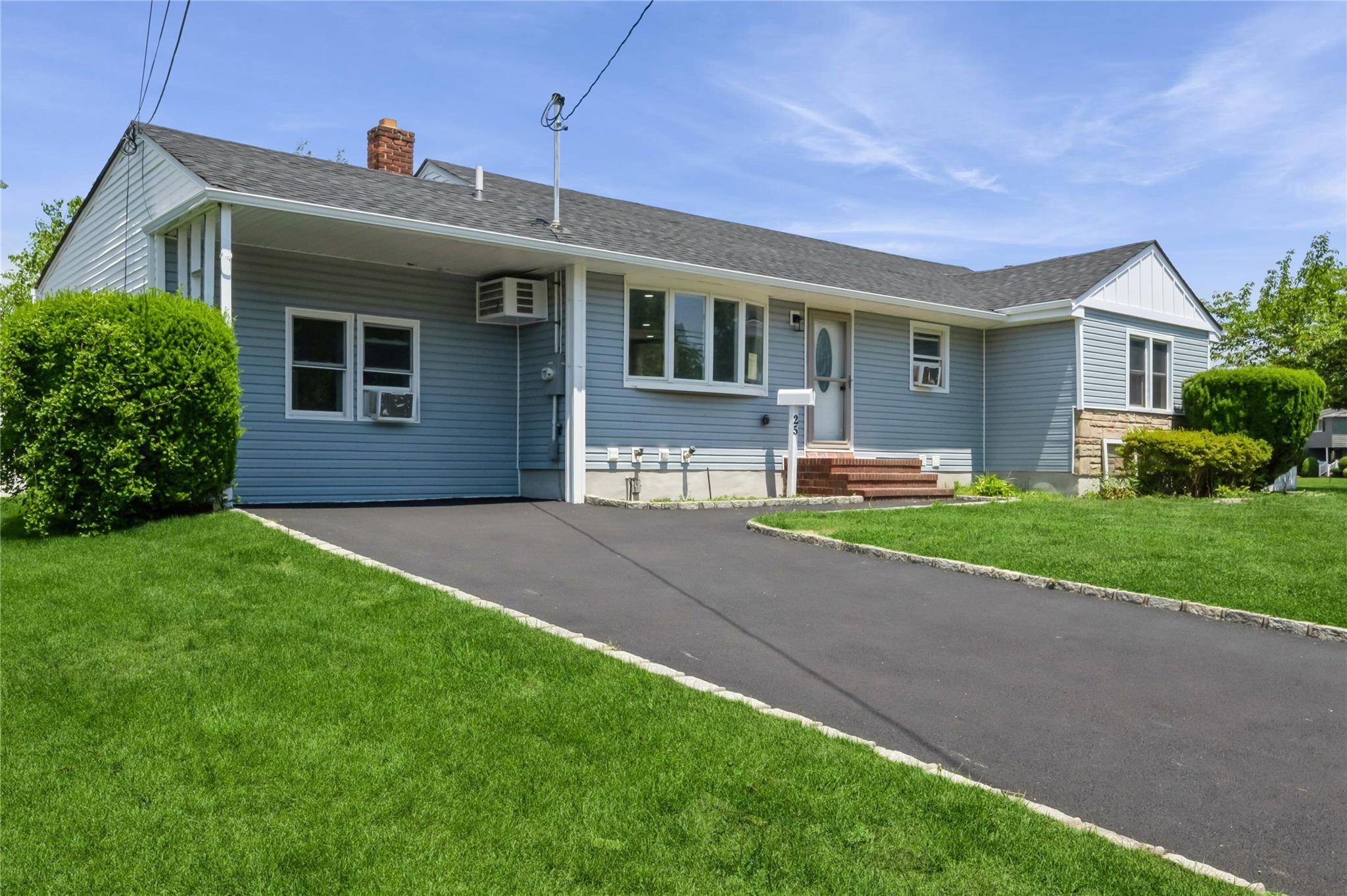 This custom rebuilt ranch in Bethpage, within the Plainedge school district, offers luxurious living with meticulous attention to detail.