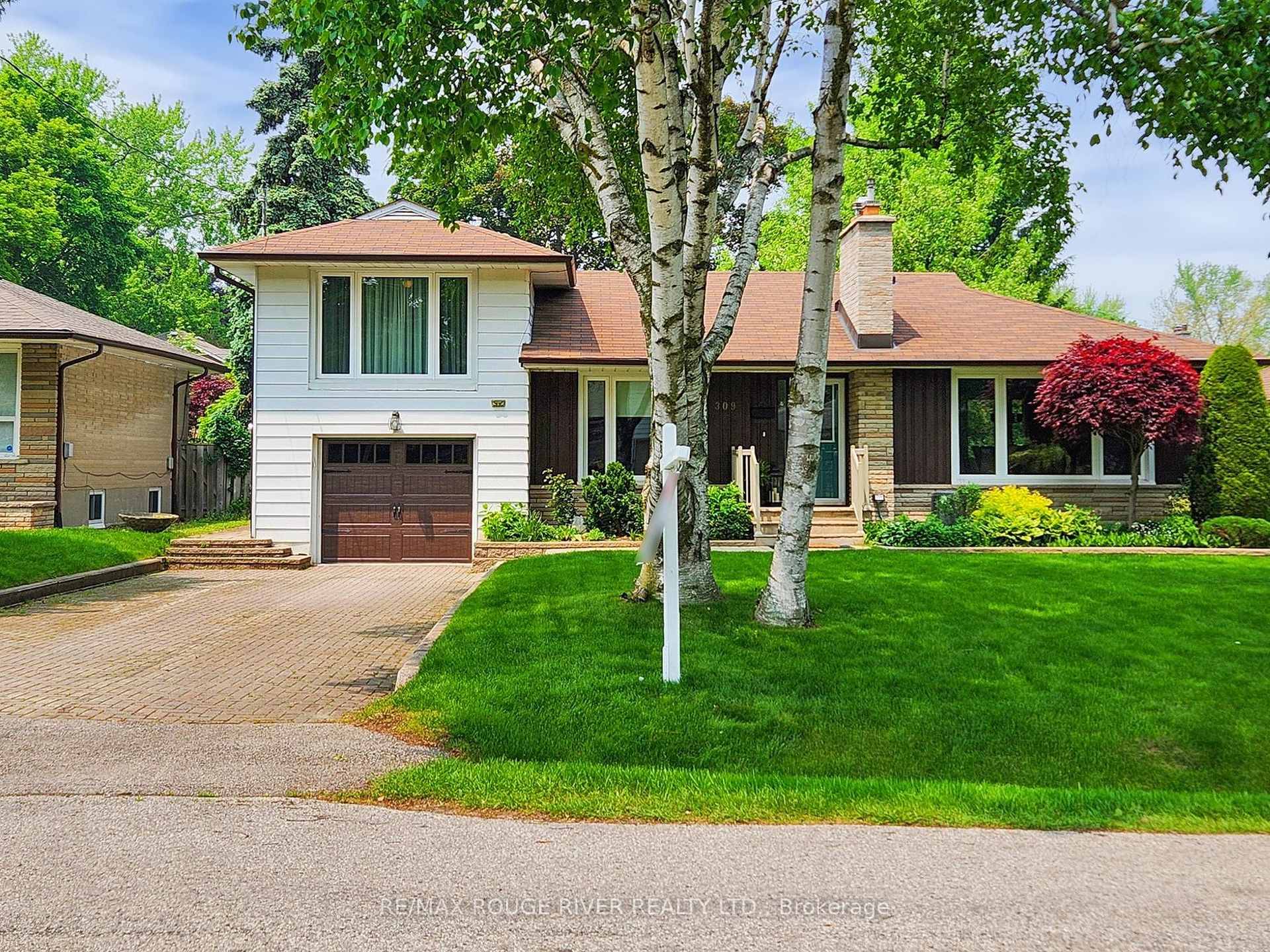 Prime West Rouge Lakeside Community Sprawling Ranch Bungalow Nestled on a Premium 60' x 125' Pool Size lot with Amazing Lush Garden Privacy.
