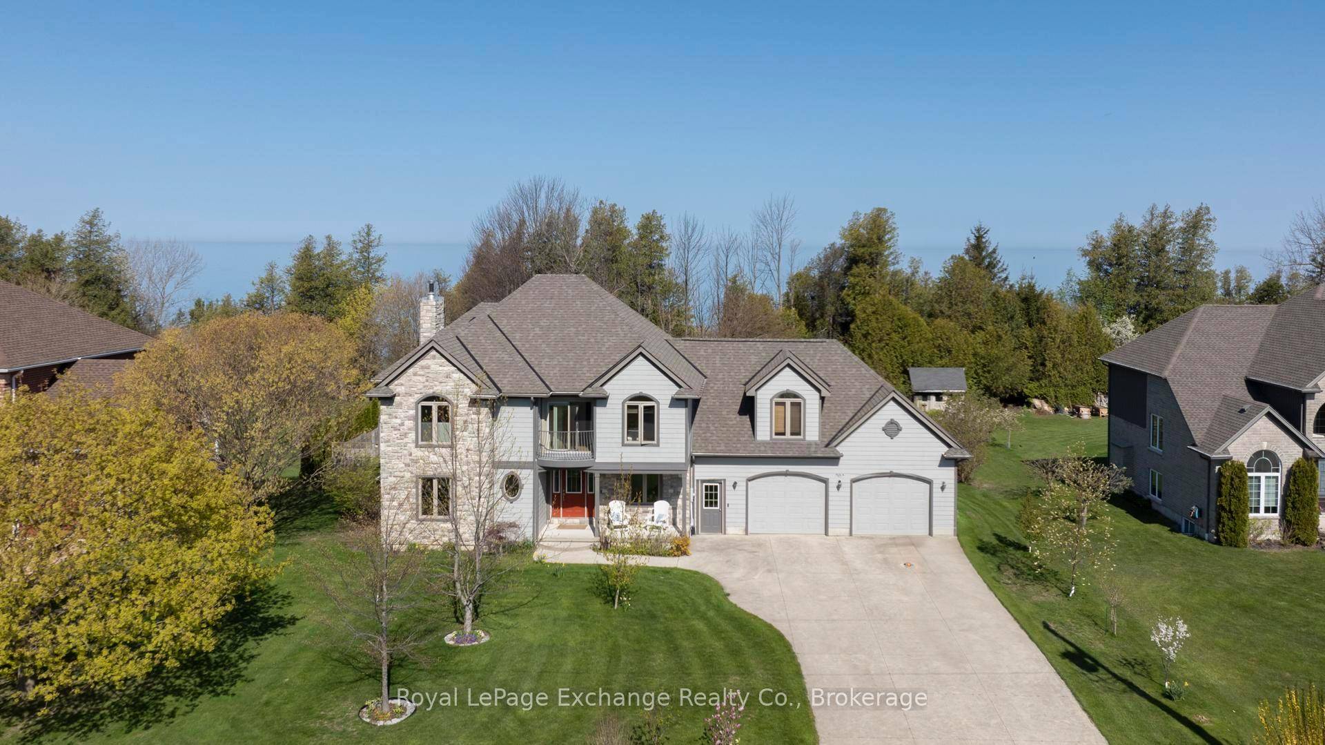 This custom built home by Quality Construction sits on a spacious 1 2 acre lot in Heritage Heights, offering breathtaking views of Lake Huron sunsets that you can enjoy from ...