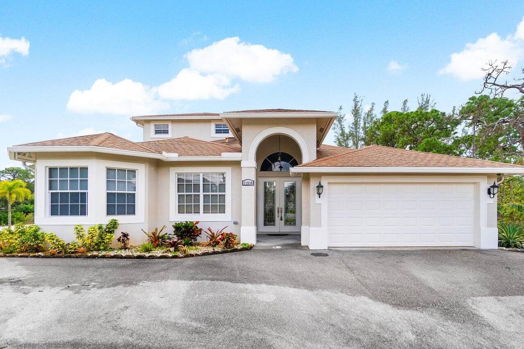 Welcome to your dream home in the heart of unincorporated Palm Beach County !