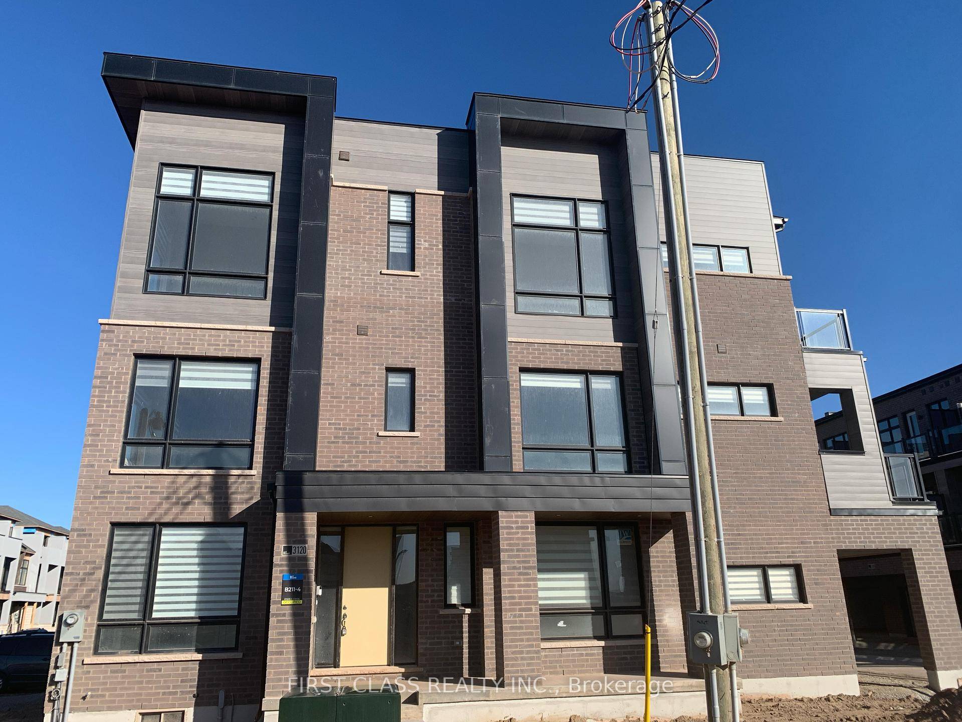 Discover luxurious living in this executive end corner unit townhome located in Oakville prestigious Joshua Meadows community.