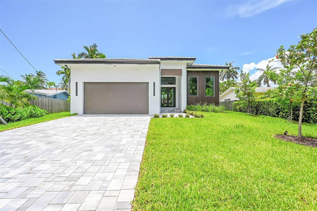 Newly constructed Wilton Manors luxury waterfront residence located on Middle River with a new 85 ft seawall and ocean access, 3 spacious bedrooms and 3 designer bathrooms, blending timeless elegance ...