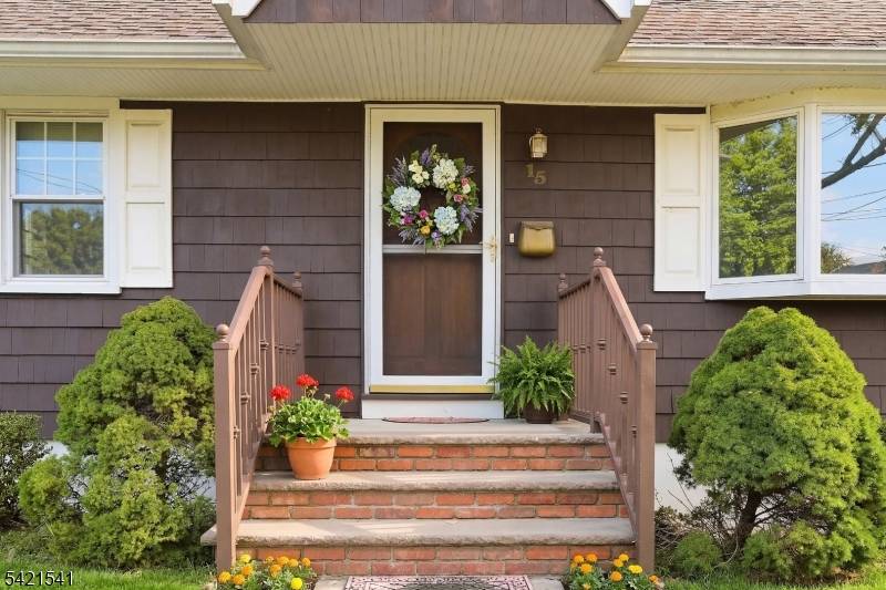 The home features 4 bedrooms, 2 full bathrooms, a living room, dining room, and kitchen, providing a functional layout for everyday living and entertaining.