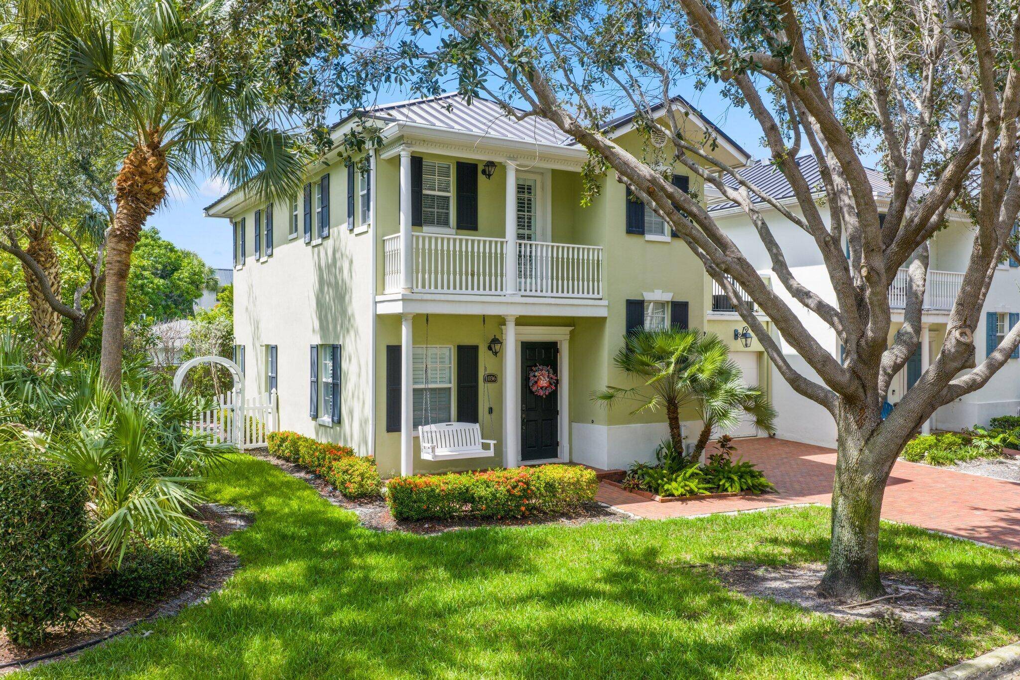 Welcome to this rarely available, 2 story, corner residence in the desirable and picturesque, Heritage Club neighborhood of east Delray.