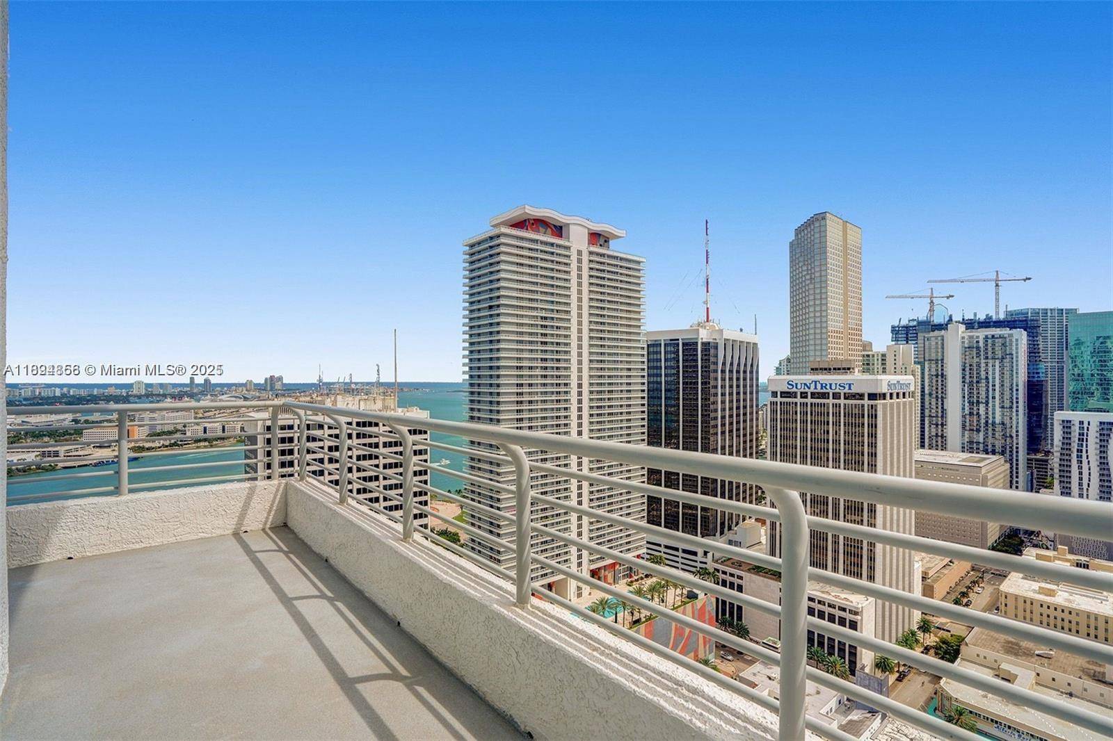 Experience the ultimate in urban living with this stunning Lower Penthouse at Loft Two in the heart of Downtown Miami.