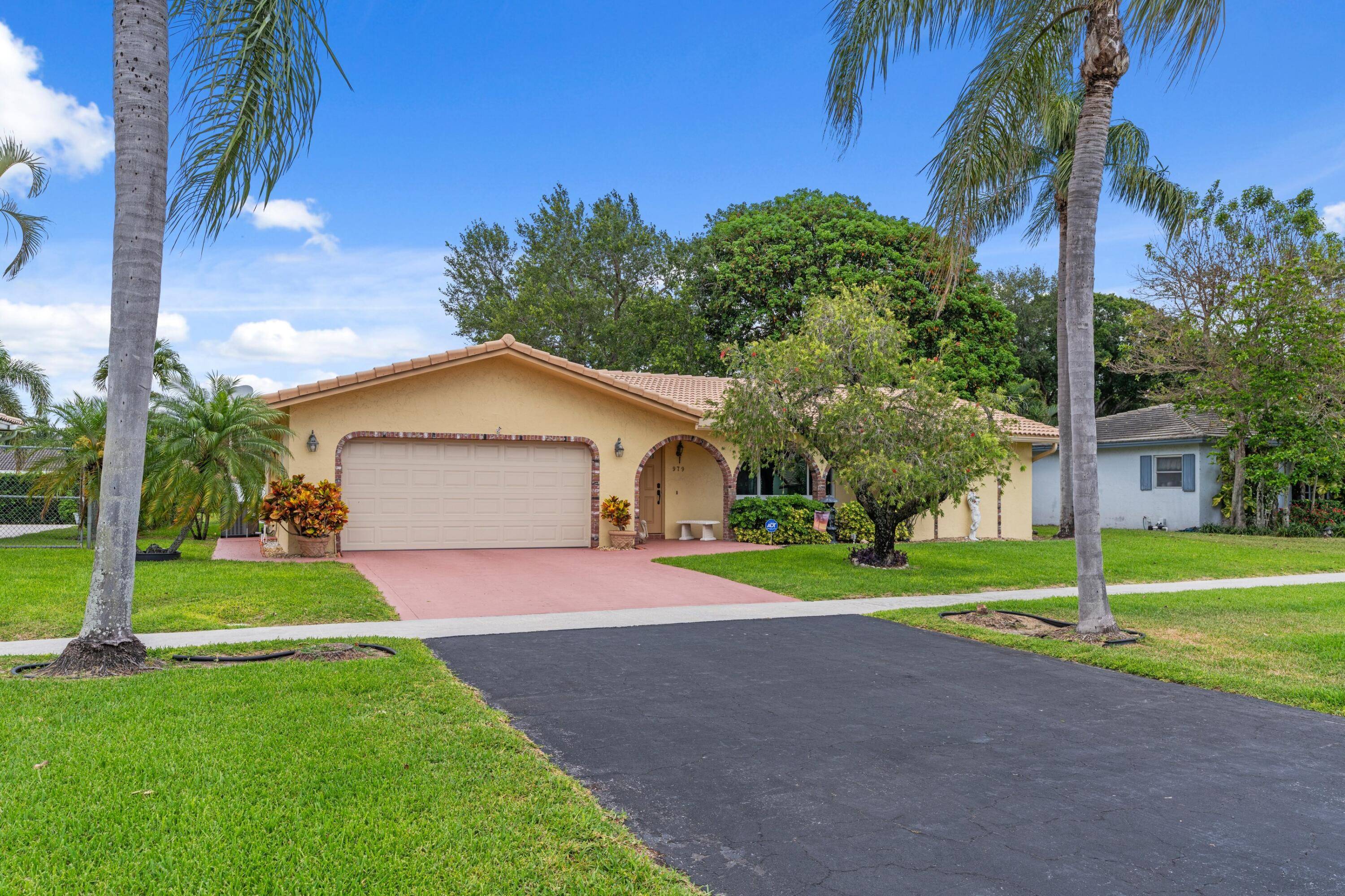 ABSOLUTELY GORGEOUS SINGLE FAMILY HOME Oversized Lot Prime East Boca Raton Location All Hurricane Impact Doors Windows Walk Bike to A Rated Schools No HOA Immaculate Manicured Landscaping Bright Open ...