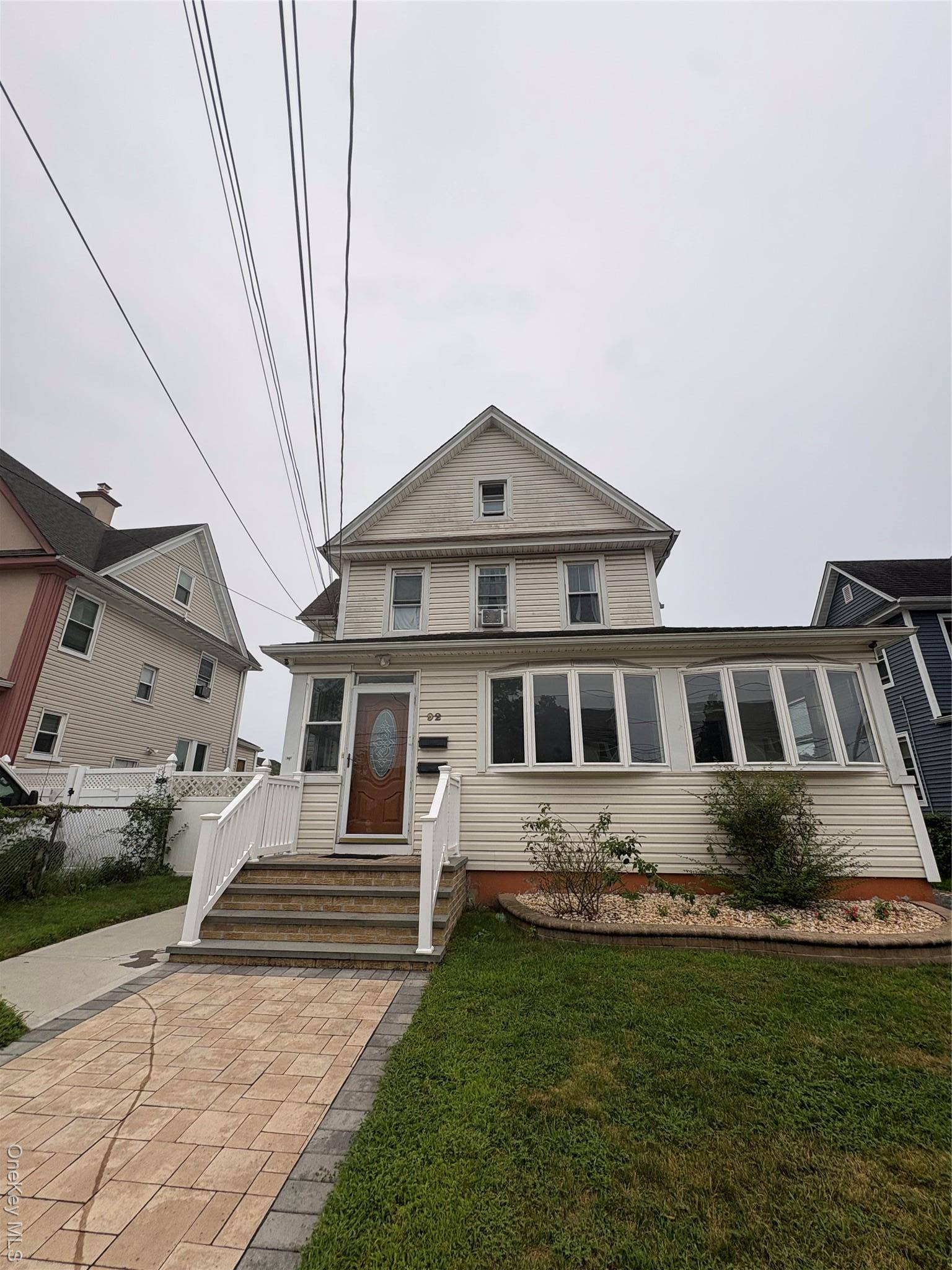 Welcome to 92 Leonard Avenue, a charming Colonial in the heart of Freeport offering timeless character and modern comfort.