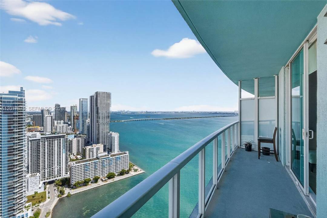 Beautiful high floor residence with breathtaking bay and skyline views in one of Edgewater s most desirable waterfront locations across from Margaret Pace Park.