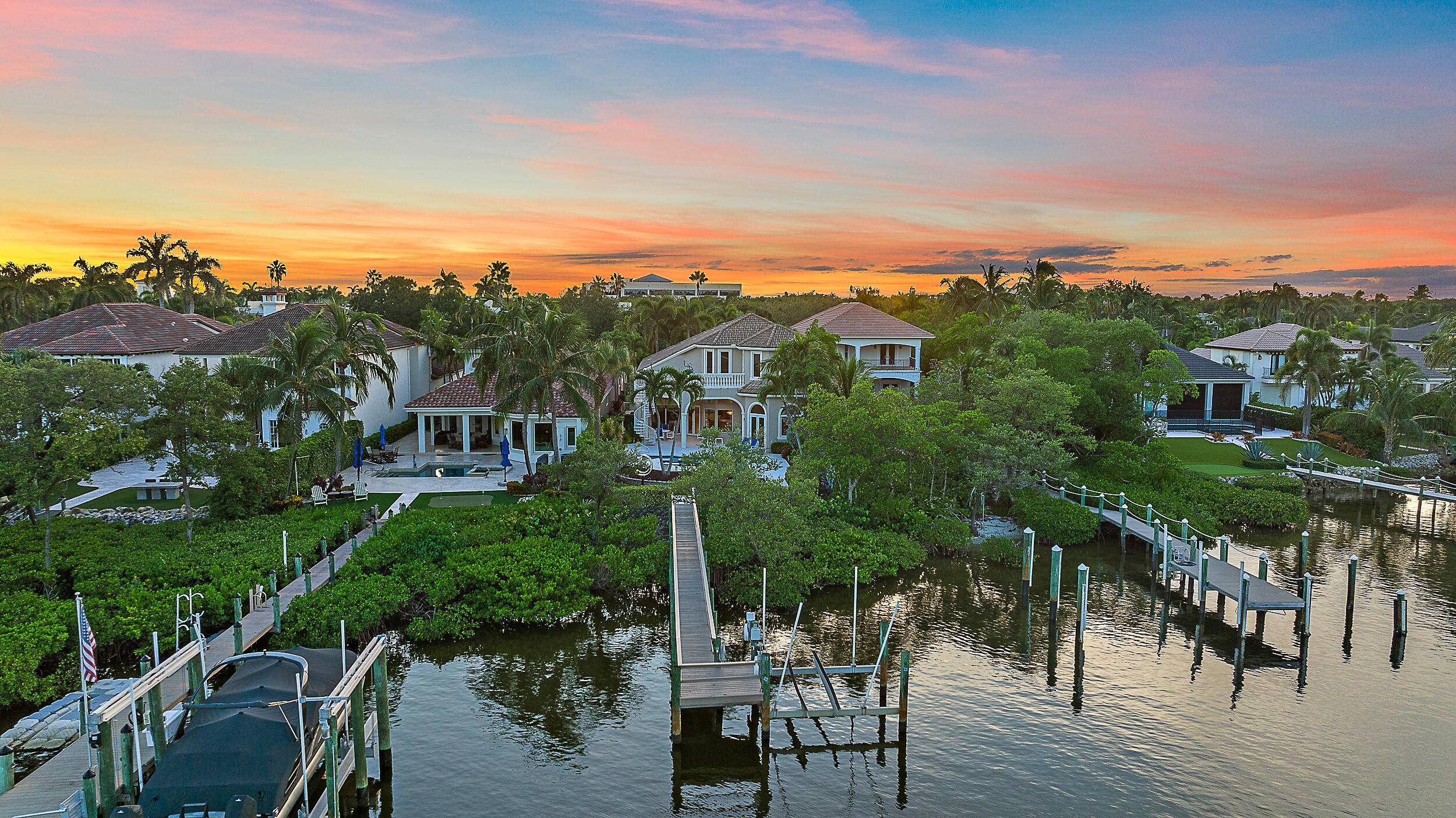 BOATERS DELIGHT Nestled on the pristine Intracoastal Waterway with direct, no fixed bridge access to the ocean this exquisite 4 bedroom home offers the perfect blend of luxury and convenience.