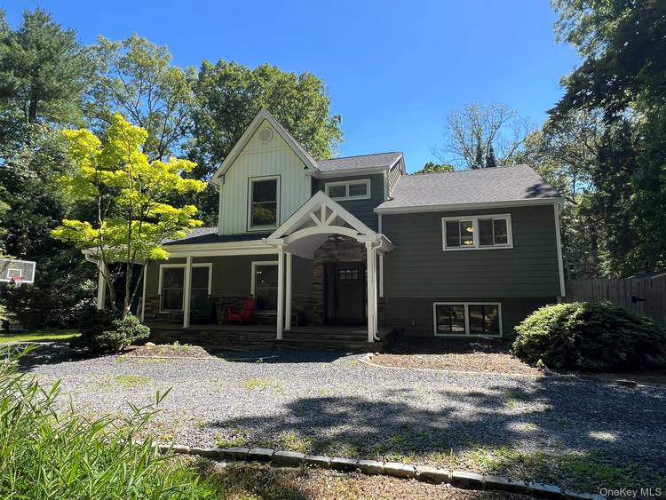Welcome to this beautifully renovated and expanded 3 bedroom, 3 bath split level home nestled on a full acre in the highly sought after Point of Woods section of South ...