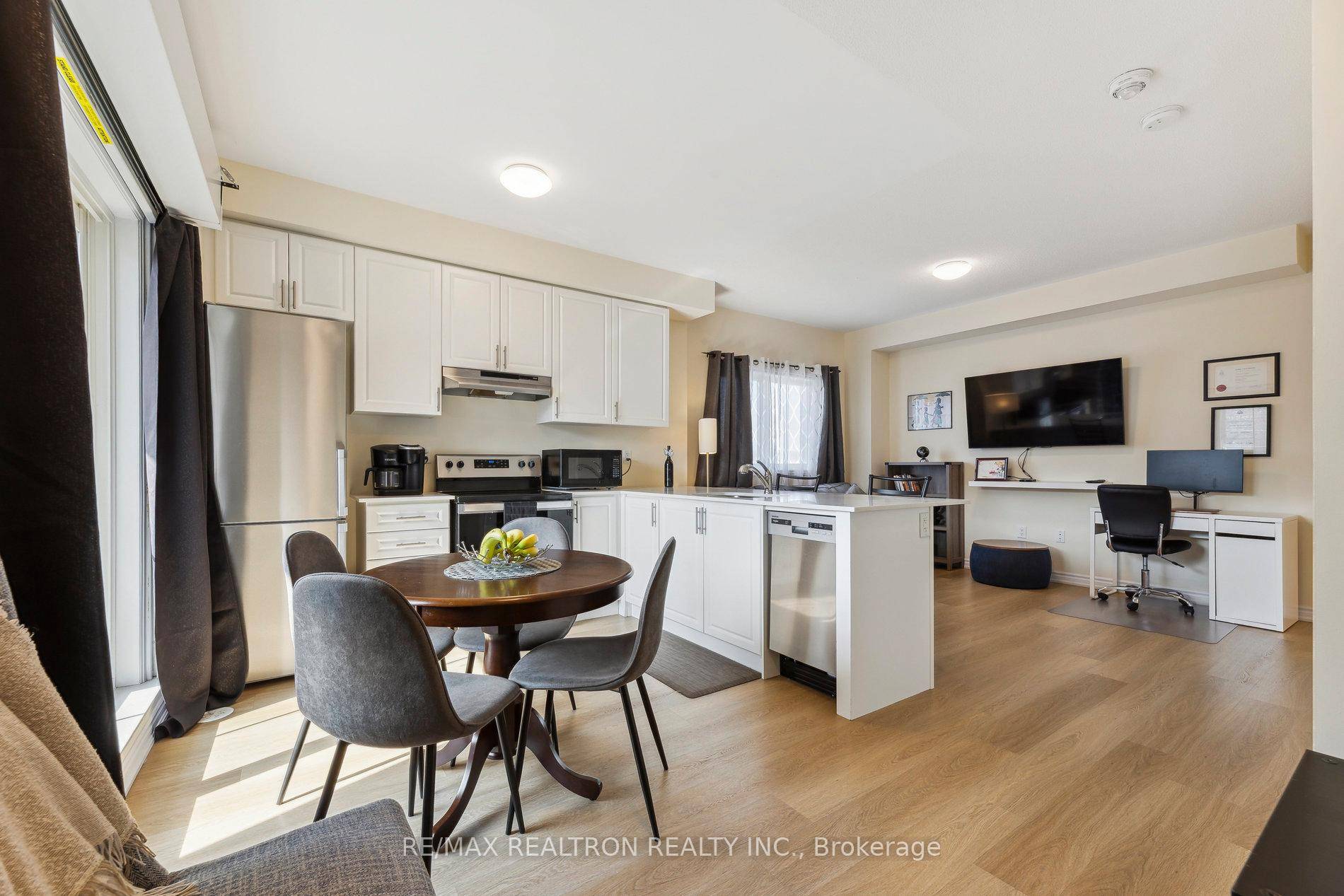 Welcome to this beautifully maintained, like new corner stacked townhouse in Central Oshawa a true end unit offering unobstructed views, larger windows, and sunlight from multiple directions.