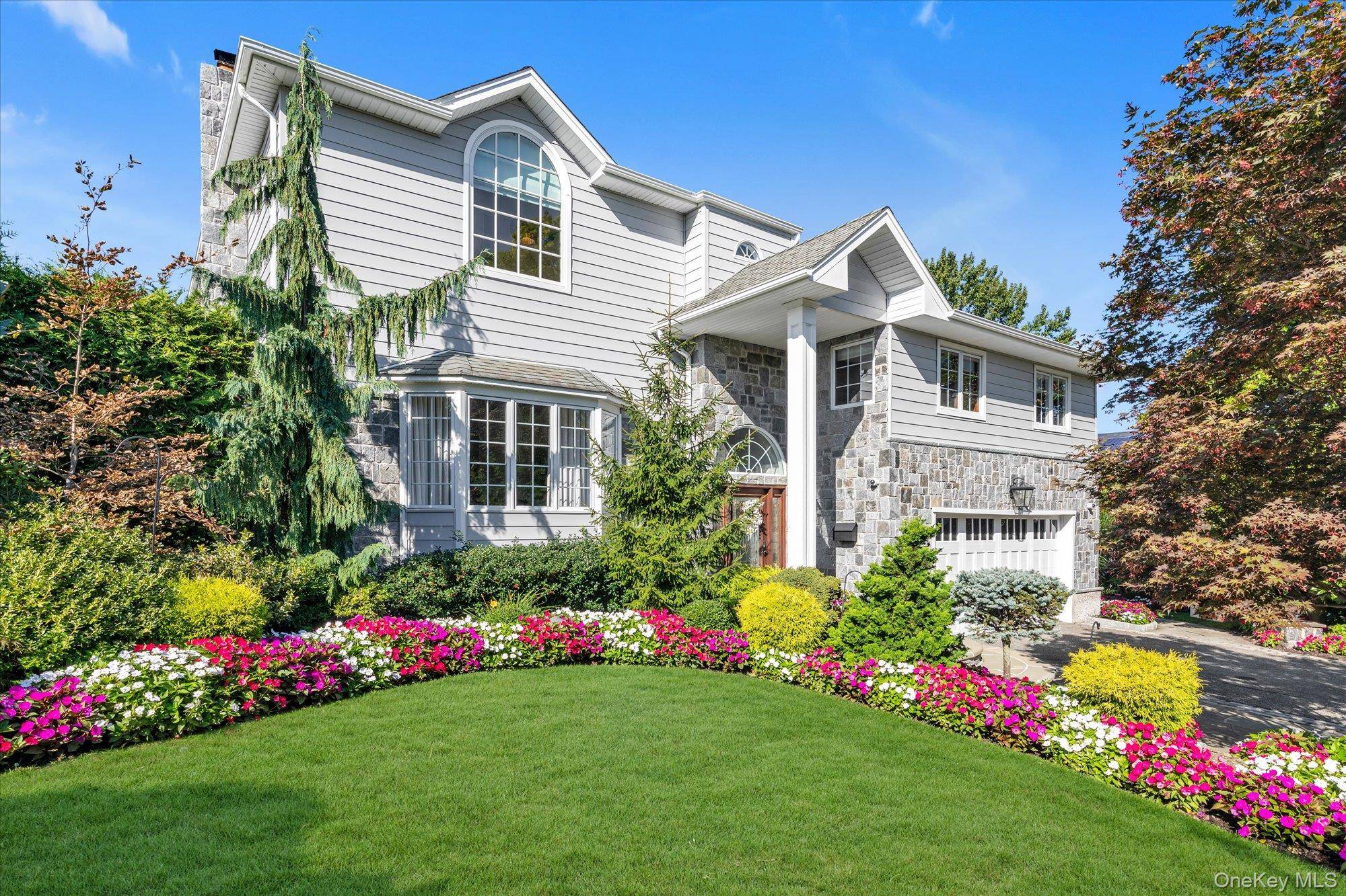 Welcome to this beautifully maintained 5 bedroom, 4 bath split level home that blends comfort, functionality, and luxury living.