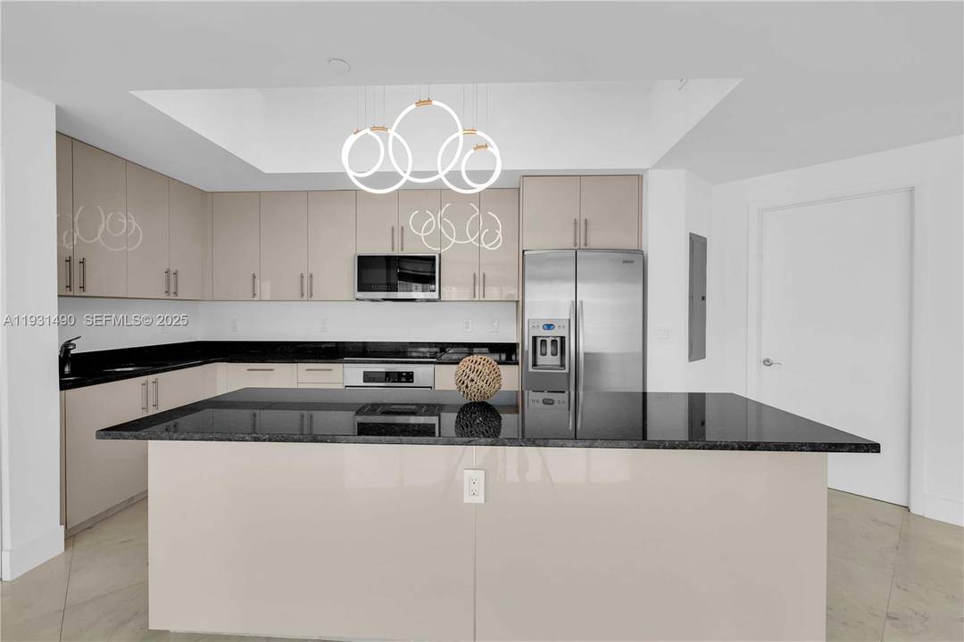 Spacious 2 bedroom, 2. 5 bath residence in Aventura featuring a desirable split bedroom floor plan, updated kitchen with modern cabinetry, generous living and dining areas, and abundant natural light.