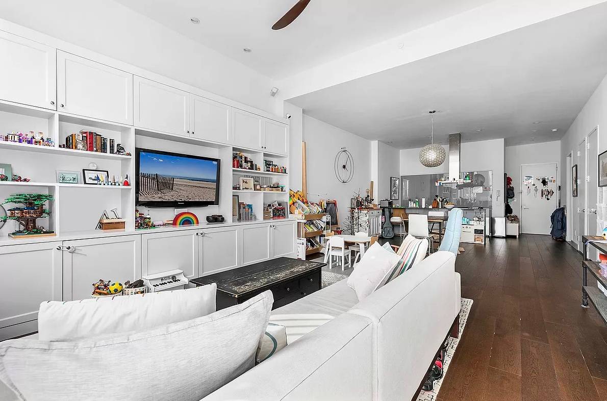 420 West 25th Street 4G offers a sleek and modern loft with three bedrooms and two full bathrooms.