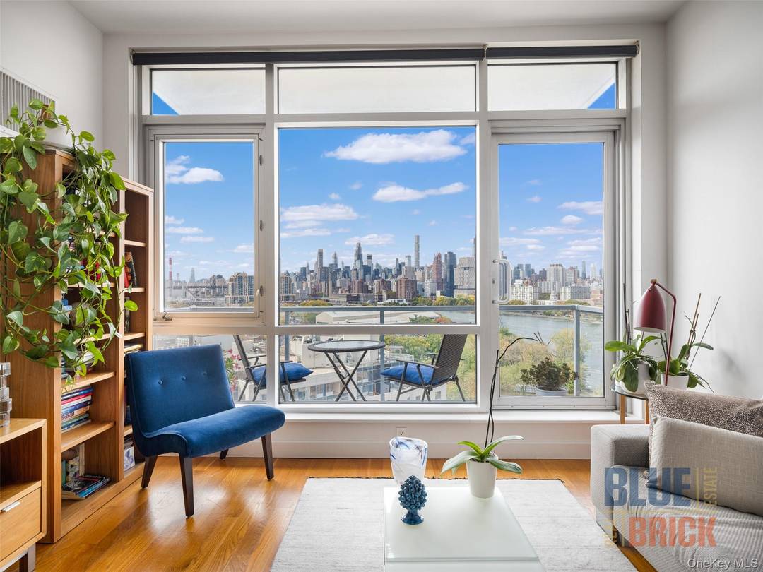 Welcome to Residence 13C at The East River Tower a spacious one bedroom home spanning over 700 square feet with a private garage parking spot included, offering breathtaking city and ...