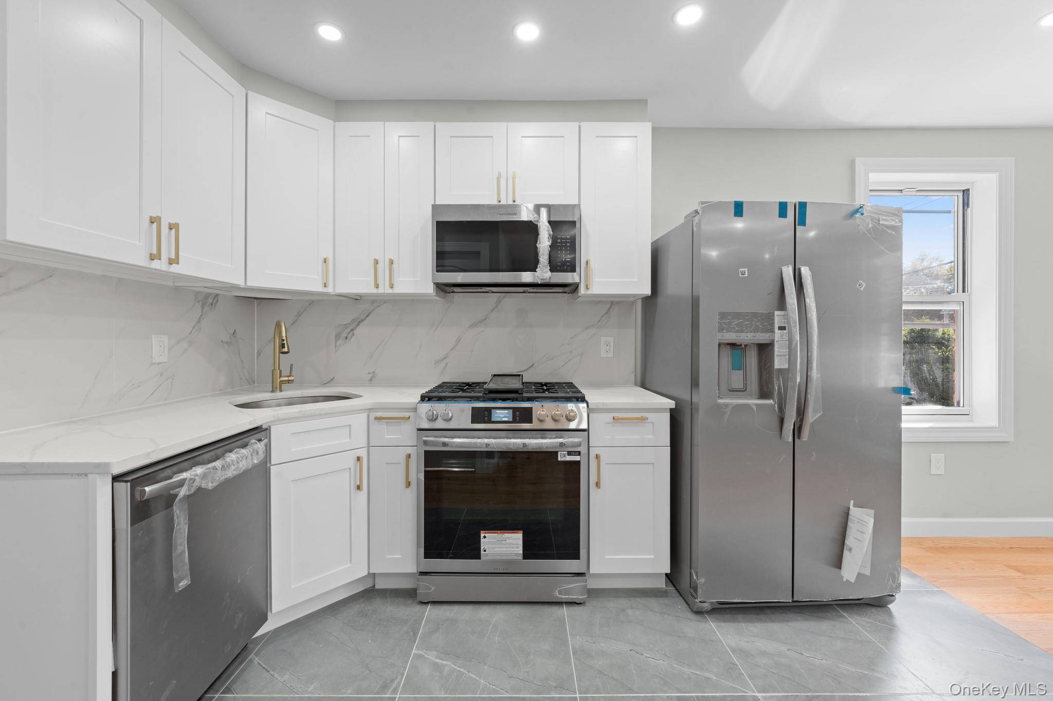 3210 Paulding Avenue is a newly renovated, turn key move in ready 20x47 built brick 2 family spanning over 1, 800 sq ft of living space.