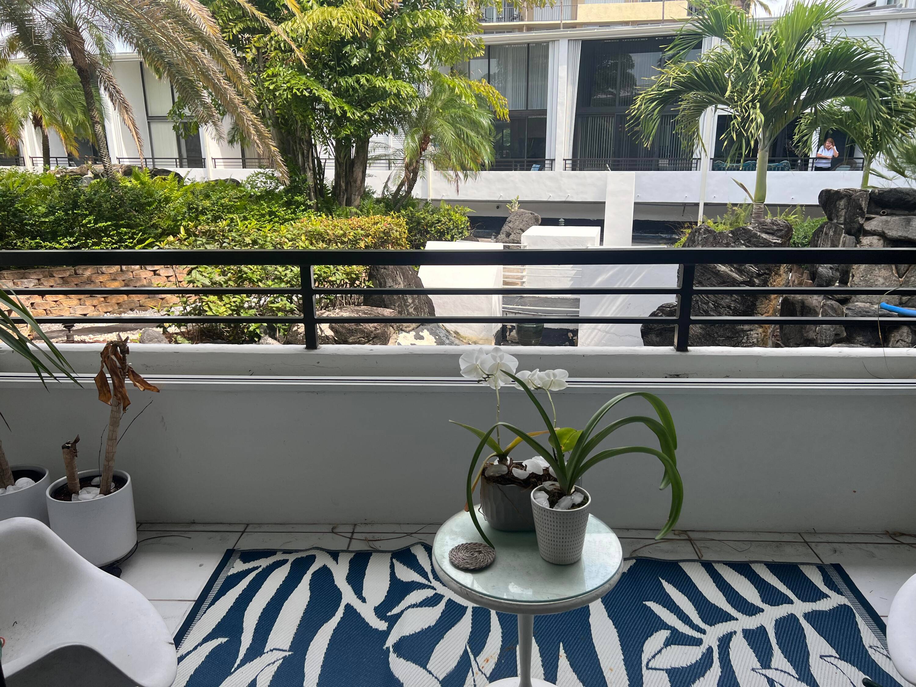 Enjoy this beautiful 1 bedroom 2 bath loft condo overlooking a tropical lagoon.