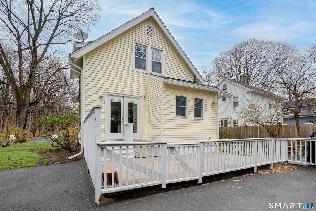 Fully renovated Colonial directly across the street from Woodland Park and.