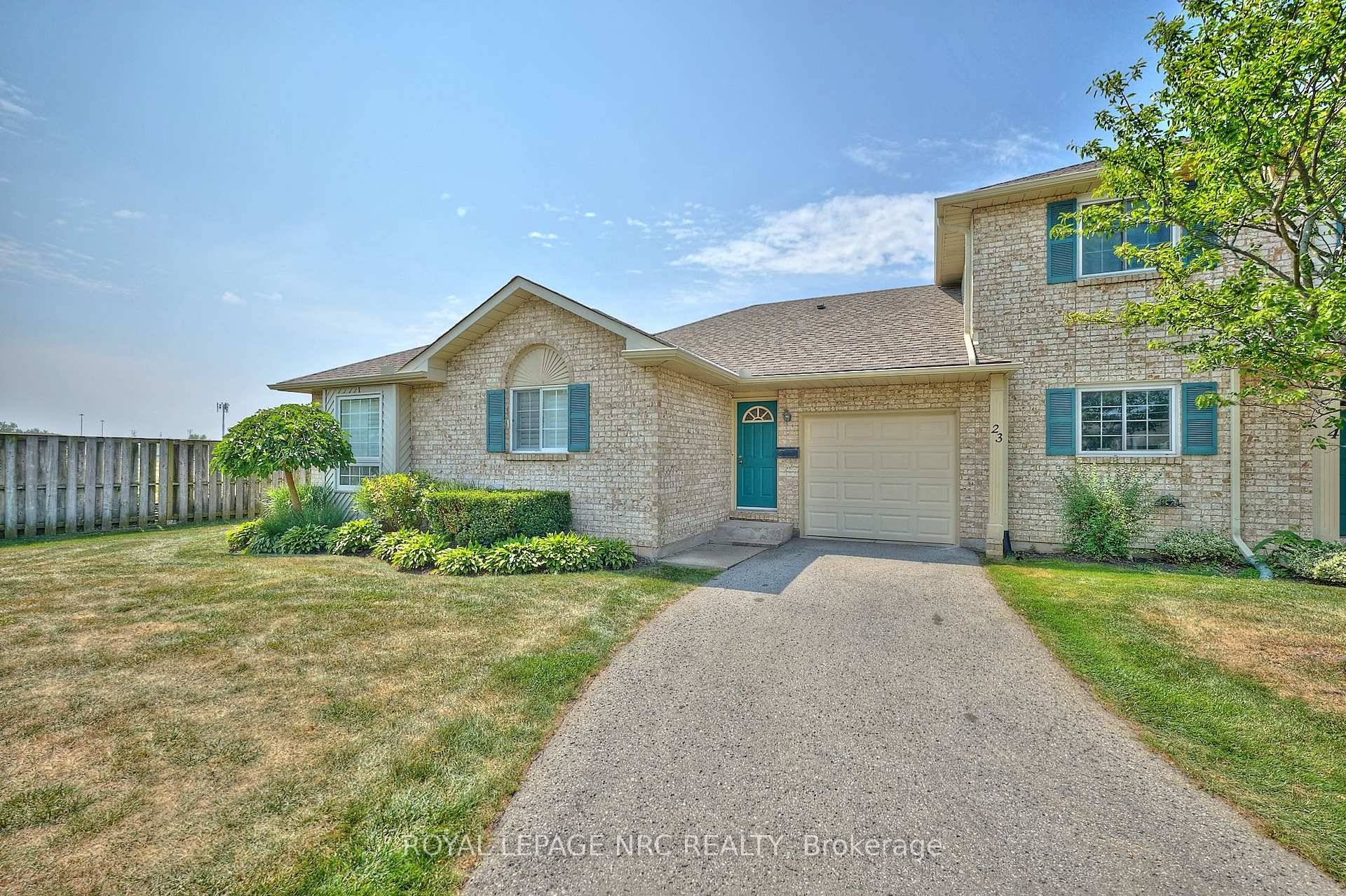 Beautifully Updated Bungalow End Unit Townhome in Prestigious Mount Carmel Estates !