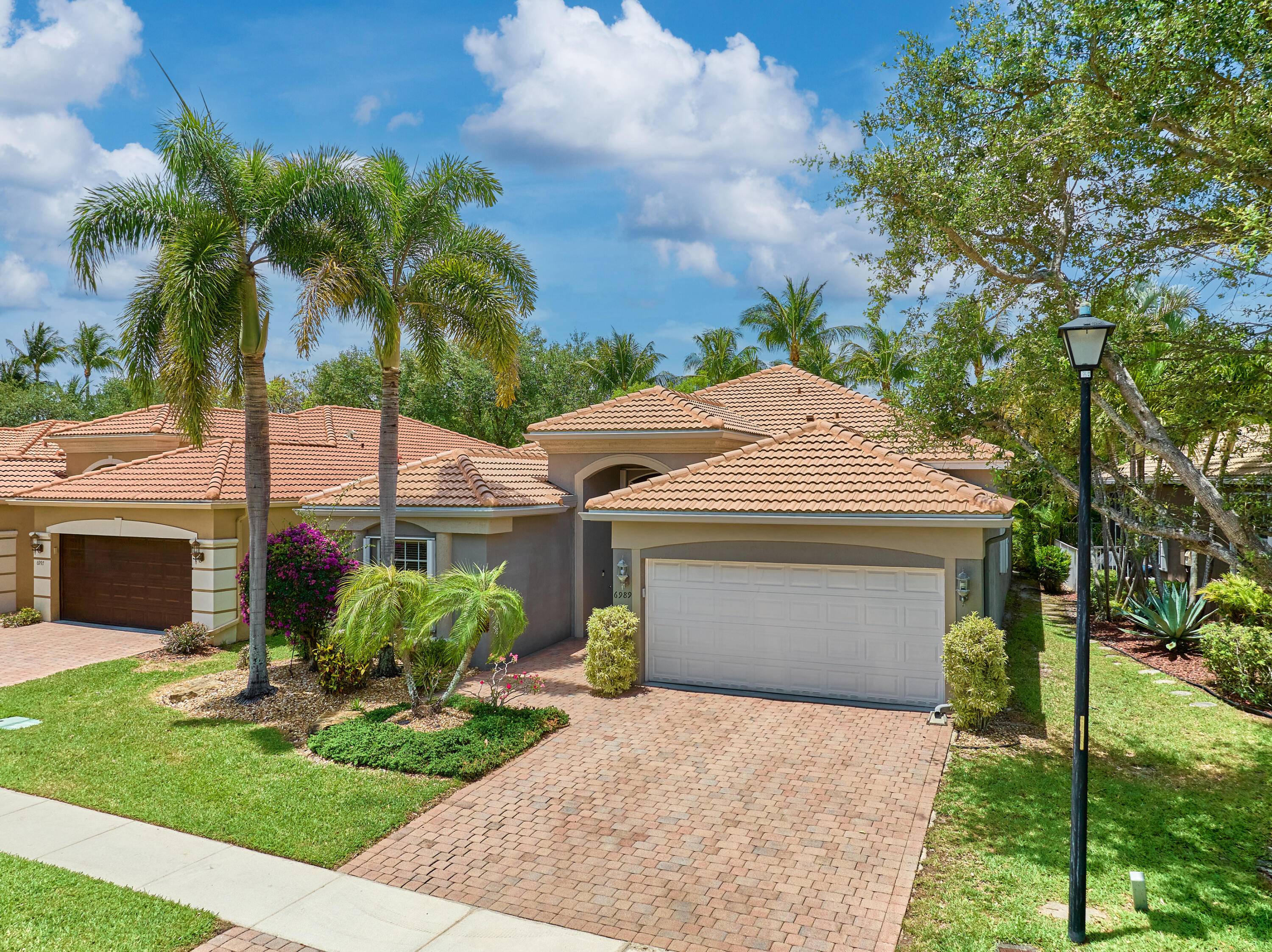 Welcome to resort style living in the prestigious 55 community of Villaggio !