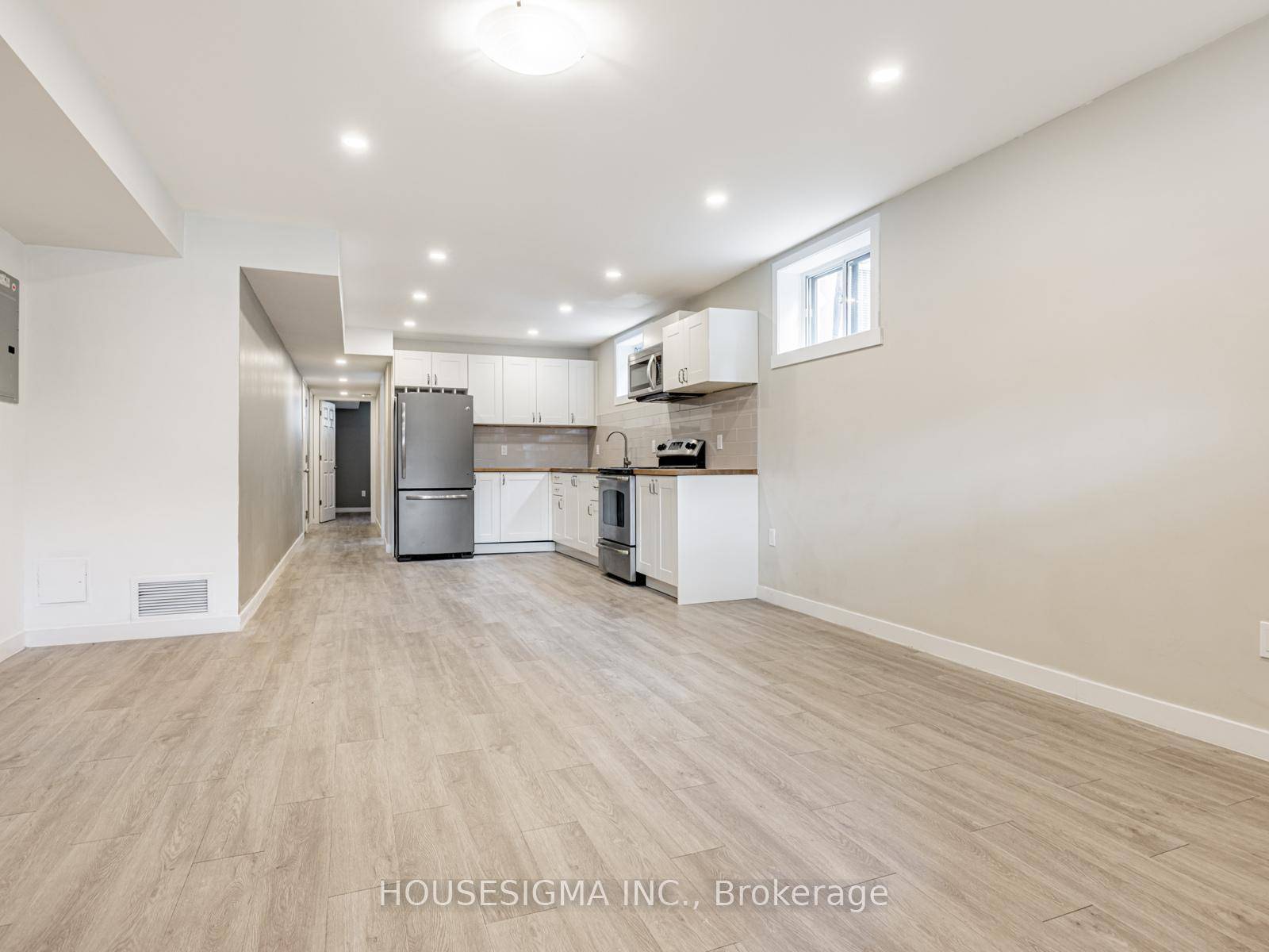 Discover this spacious 2 bedroom lower level unit in the heart of Long Branch, offering a rare combination of size, natural light, and outdoor space.