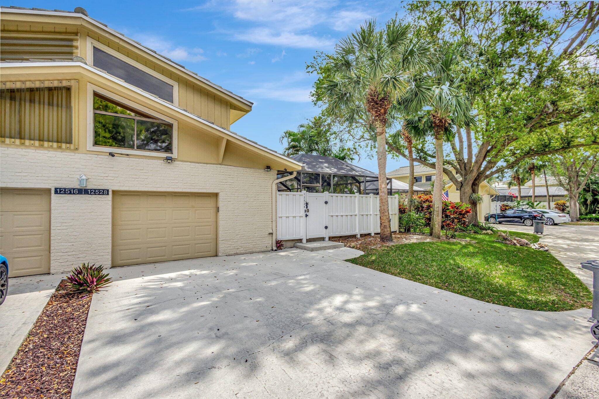 Excellent opportunity to own a townhouse with 3 bedrooms, each with dedicated bathrooms, plus a separate 1 2 bathroom, private fenced courtyard, and garage with speckled epoxy flooring.