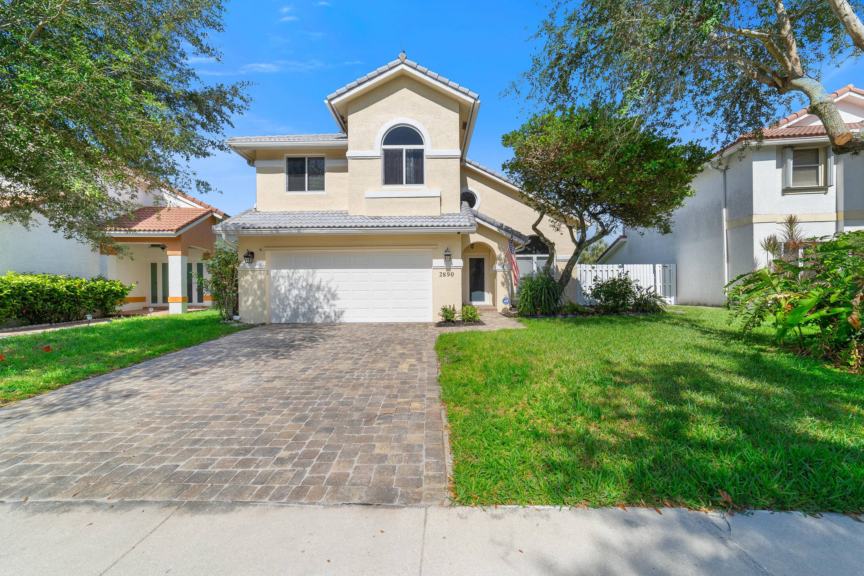 Tucked away in Coral Lake Estates, this charming 3 bedroom, 2.